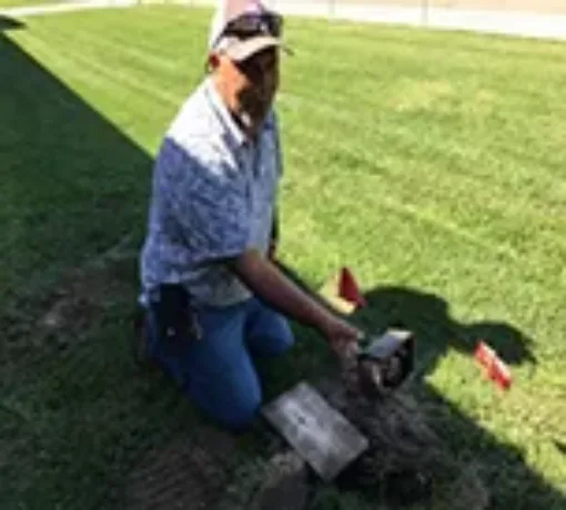 Man monitoring the soil